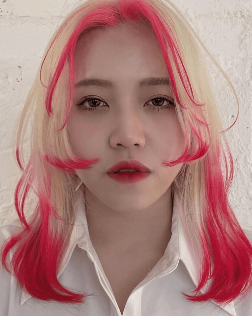 hime cut with blonde hair and highlights