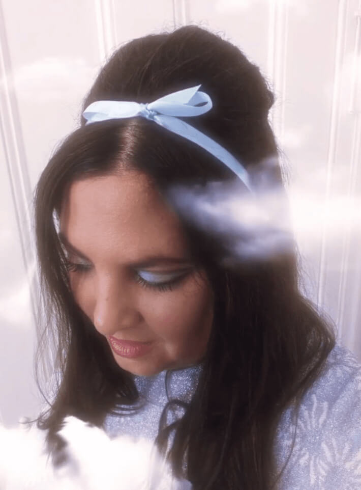 beehive hairstyle with headband