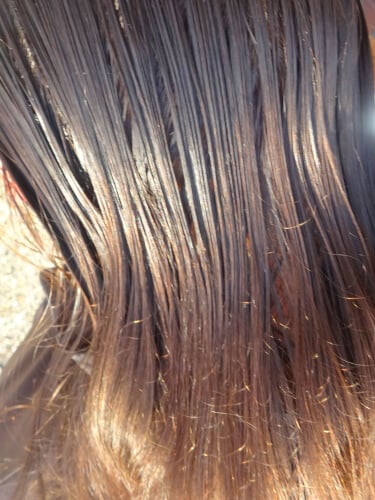 black hair with gold strand