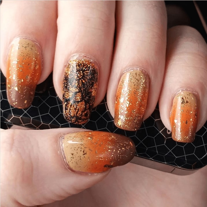 red Ombre nails with glitter and diamonds
