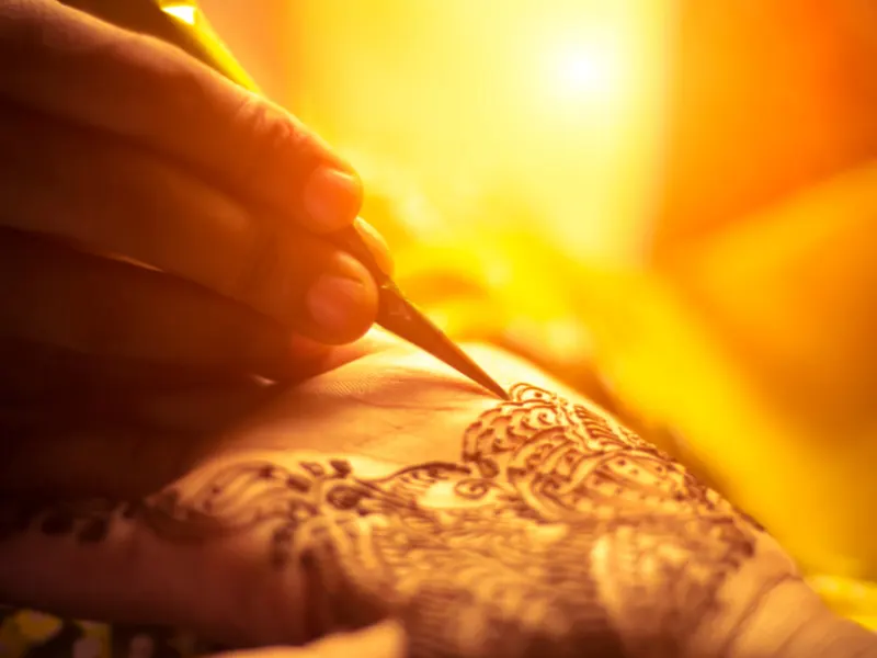 Why is my henna tattoo orange?