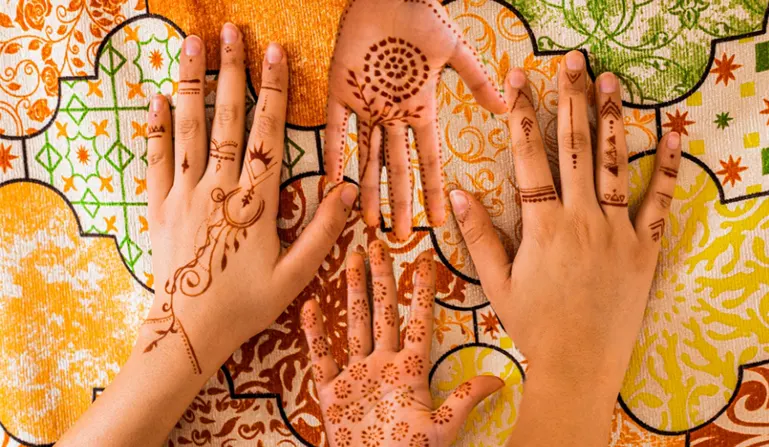 Why is my henna tattoo orange