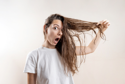 causes of hair feeling sticky when wet