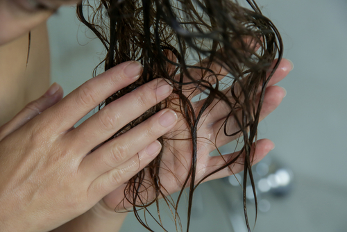 hair feels sticky when wet