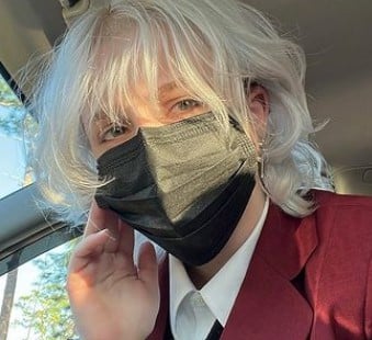 Layered Tousled Hair with Platinum Bangs